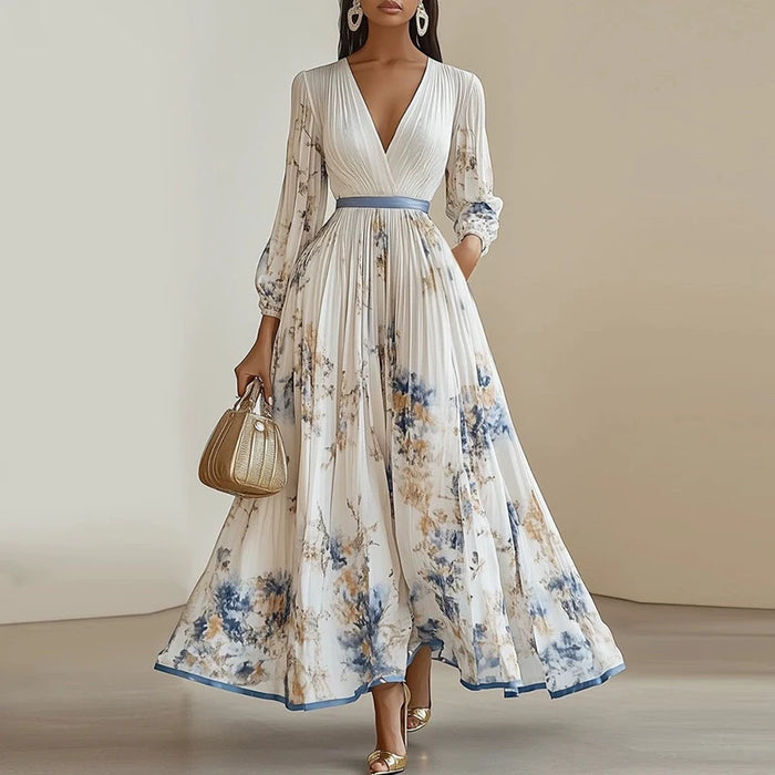 Woman wearing a deep V-neck bohemian ankle-length dress with printed pattern – perfect for spring and summer occasions.