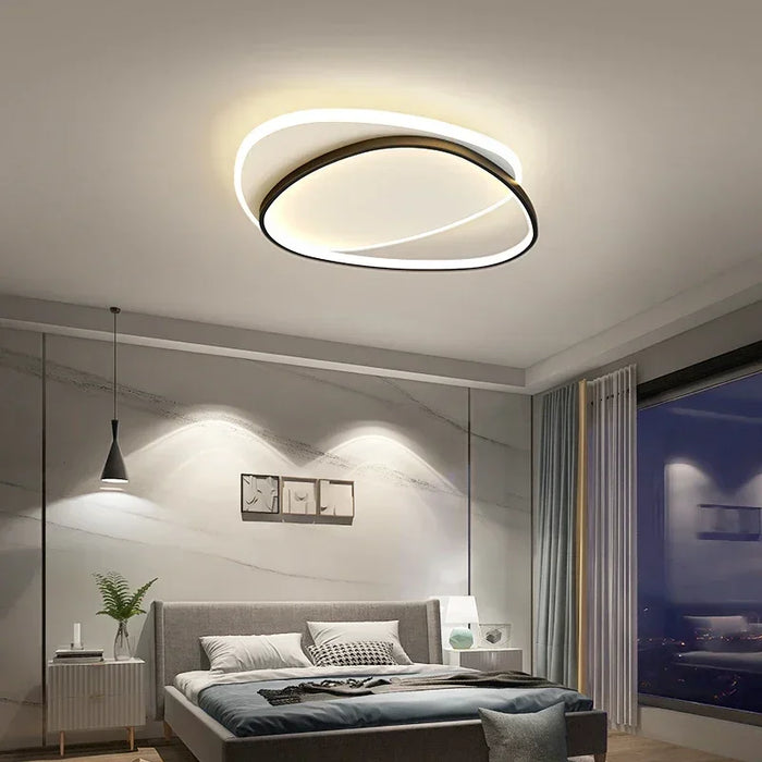 Modern minimalist sculptural LED ceiling light fixture for living room or bedroom interior