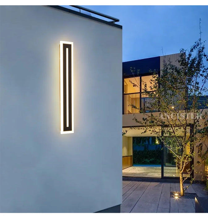 Modern waterproof long strip LED wall light for outdoor courtyard or indoor hallway.