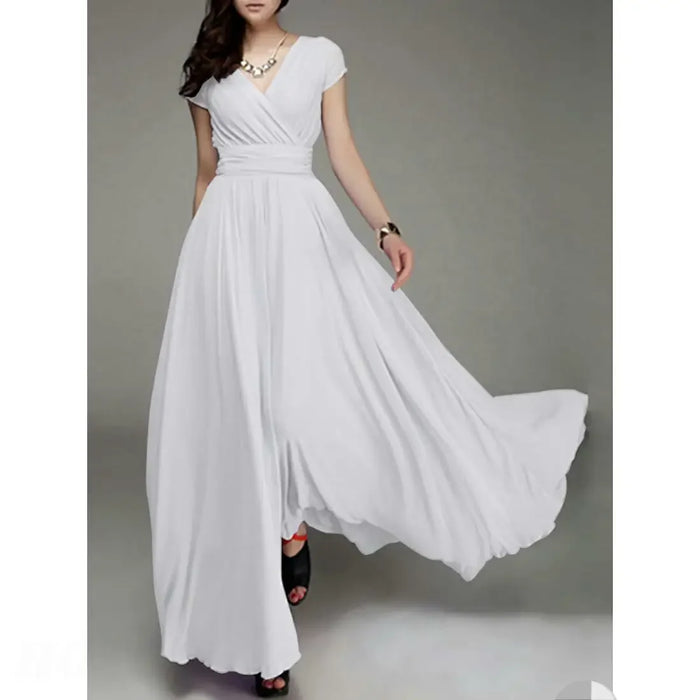 High-waist summer mini dress with batwing sleeves and flowing chiffon fabric