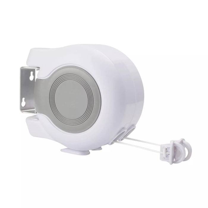 Double retractable clothesline mounted on wall for outdoor laundry drying