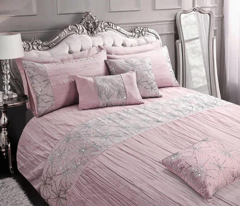 Sequin pleated microfibre duvet cover set with star sequin burst and lace detailing, ideal for a glamorous bedroom style.