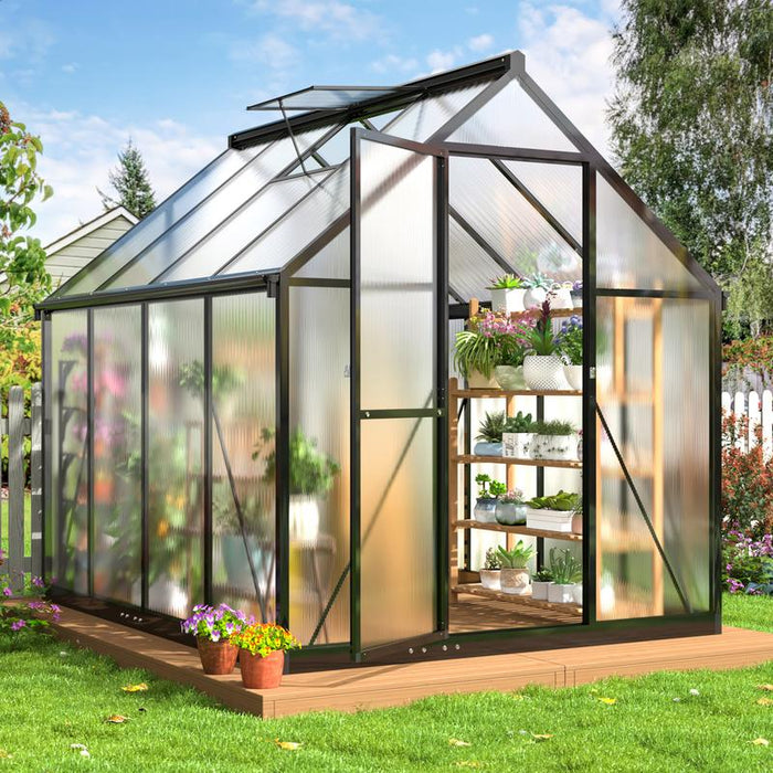 Greenhouse with durable aluminum frame, UV-coated polycarbonate panels, and adjustable ventilation for optimal plant care.