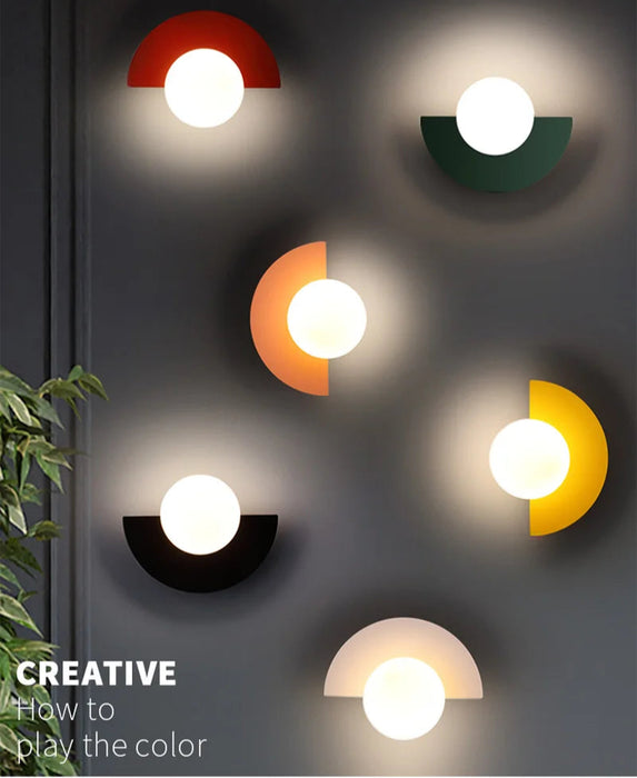 Nordic LED wall lamp with round ball design for stylish interior lighting