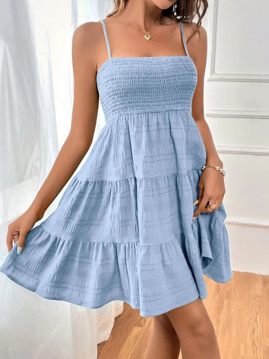 Woman wearing a lightweight casual summer dress made from soft stretchy fabric, ideal for warm weather