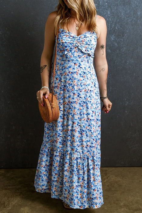 Model wearing ruched ruffle hem printed cami dress with stretchy viscose fabric and ruffle detailing