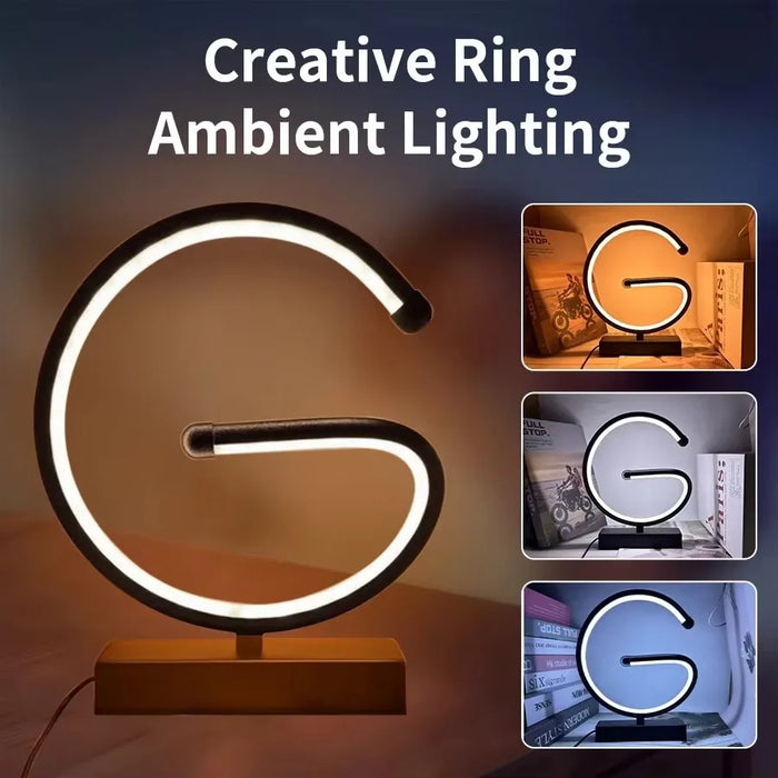 Letter G LED ring lamp on a modern desktop as a stylish decorative accent