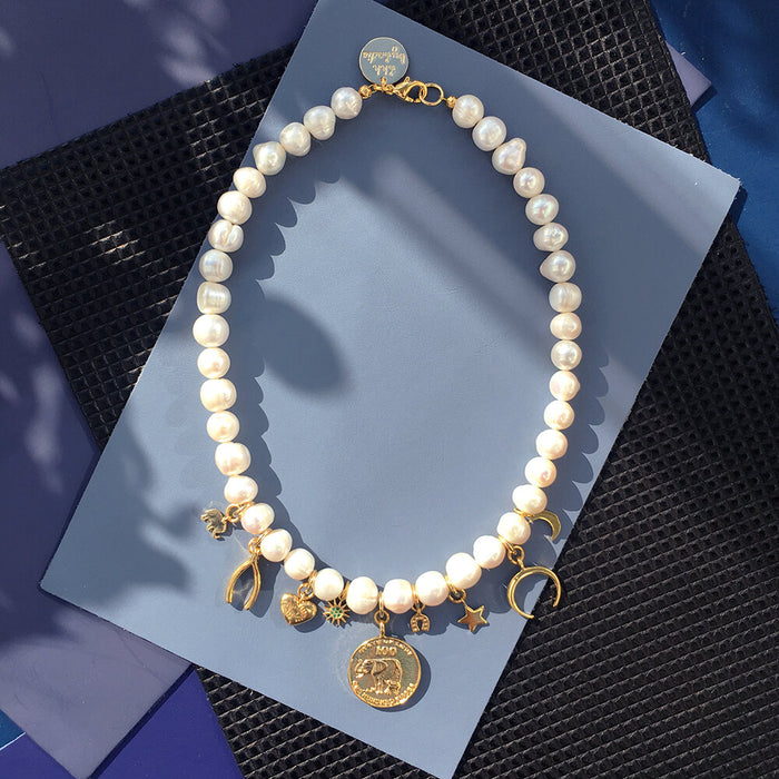 Lucky Charm Necklace with freshwater pearls, gold-plated charms, and colorful crystals