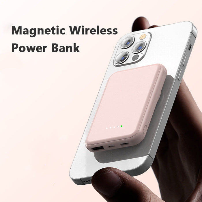 Compact 5000mAh magnetic wireless power bank in pink, green, black, and white – compatible with iPhone and Android