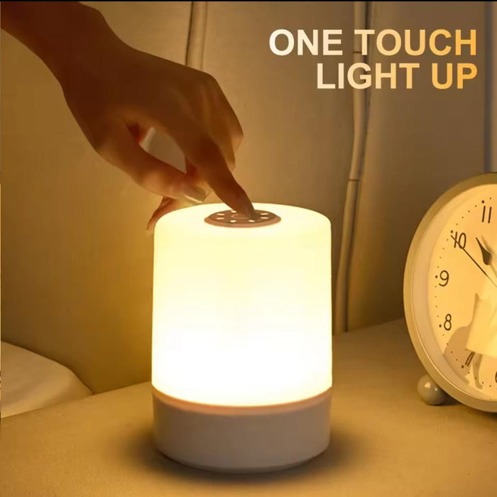 Minimalist touch-controlled rechargeable LED night lamp on bedside table
