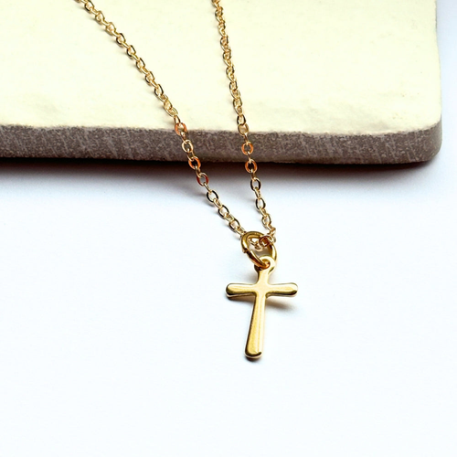 Gold cross charm necklace with 18-inch chain, perfect for communion or birthday gifts