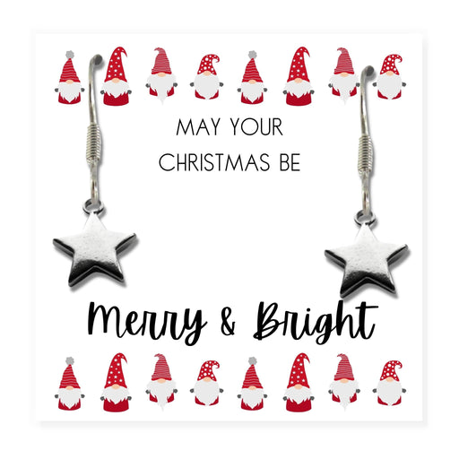 Pair of silver star charm drop earrings with Sterling Silver plated, nickel-free hooks, displayed on a "Merry & Bright" message card inside a black box.