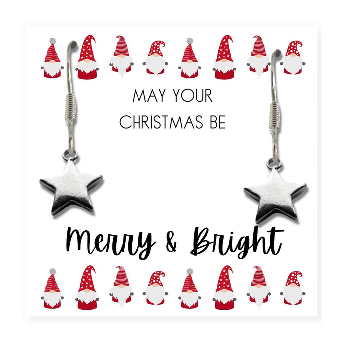 Pair of silver star charm drop earrings with Sterling Silver plated, nickel-free hooks, displayed on a "Merry & Bright" message card inside a black box.