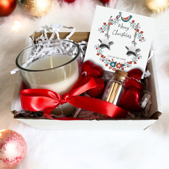 Christmas gift hamper with star earrings, linen scented candle and caramel chocolates

