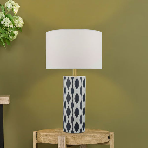Weylin table lamp with navy and white glazed ceramic base and white faux silk shade

