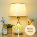 Crystal desk lamp providing soft ambient lighting on bedside table