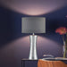 Bokora table lamp with hammered silver ceramic base and grey satin drum shade


