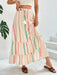 Plus size frill tie waist maxi skirt in lightweight polyester, perfect for casual and summer wear