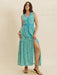 Woman wearing a breezy sleeveless viscose slit maxi dress, ideal for summer comfort