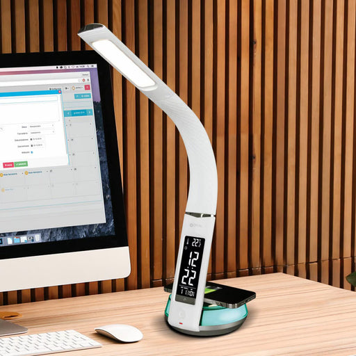  desk lamp with wireless charging pad, adjustable brightness, and color-changing base on a modern desk
