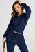 Women’s two-piece activewear set with drawstring hoodie and joggers in soft stretchy fabric
