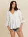 Women's lace flounce sleeve blouse with V-neck cutout and ruched detail in lightweight viscose