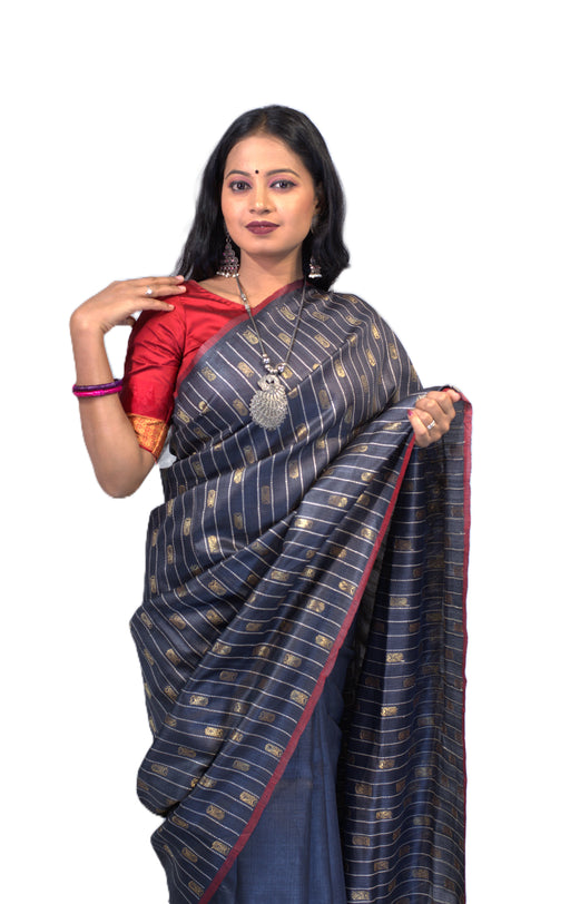 Elegant Tussar Silk Saree with golden sheen and traditional Indian motifs