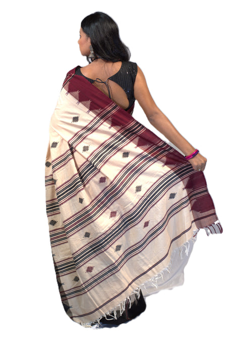 Kotpad Saree – Natural Color with Contrasting Tribal Motif Border