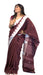 Elegant Kotpad saree handwoven in Odisha with natural Aul tree dyes, tribal motifs, and matching blouse piece