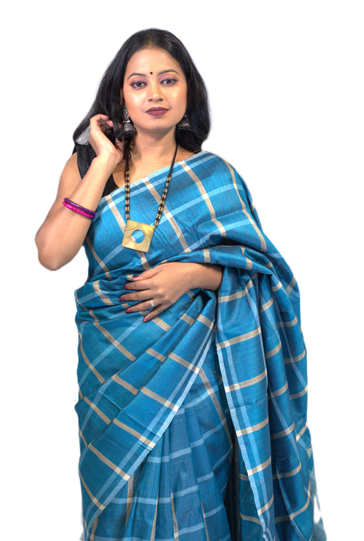 Handwoven Tussar silk saree with golden sheen, featuring Madhubani and Pattachitra art motifs, includes matching blouse piece