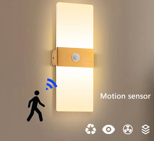 Modern LED wall light with PIR motion sensor, up & down design, black aluminum body, and acrylic shade for bedroom and corridor lighting