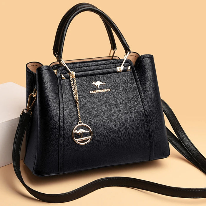 Women’s soft leather shoulder bag with tassel pendant – fashion tote handbag

