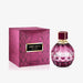 Luxury perfume bottle surrounded by plum, lychee, vanilla orchid, jasmine flowers, and sandalwood chips


