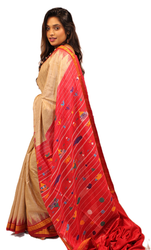 Tussar silk saree with natural golden sheen and intricate motifs, lightweight fabric with blouse piece