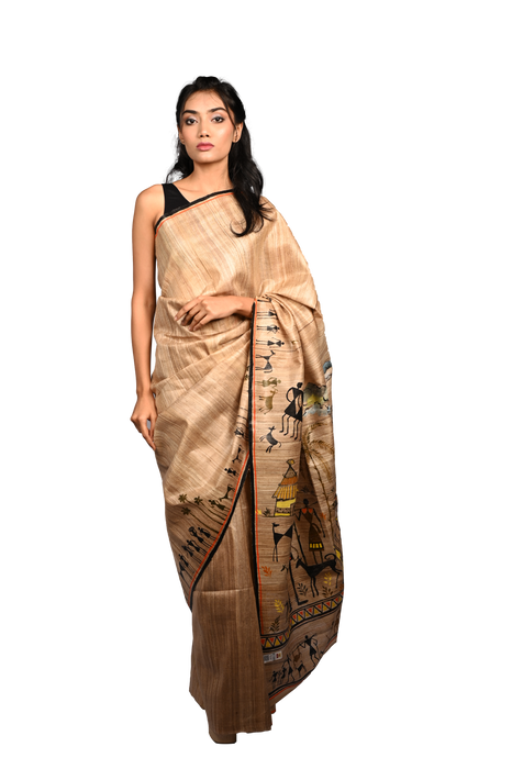  Handwoven Tussar Silk Saree with Warli tribal art showcasing geometric motifs and traditional Indian designs
