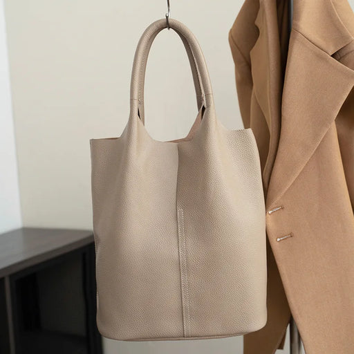 Shucai genuine leather women’s bucket bag in solid color with interior zipper pocket and two handles, soft and versatile for all-season use