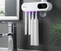 Modern wall-mounted toothbrush holder with 4 magnetic cups, built-in toothpaste dispenser, and LED display showing time and temperature