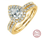 Pear cut yellow gold tone sterling silver bridal ring set with halo zircon.