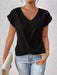 Woman wearing a slim-fit white V-neck short sleeve blouse ideal for casual and office wear.