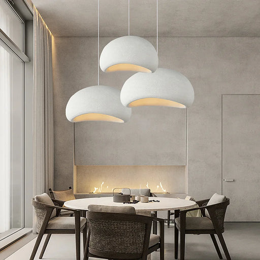 Nordic Wabi-Sabi 3-Light LED Pendant Lamp hanging over modern UK dining table with minimalist décor
