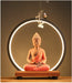 Ceramic Sakyamuni Buddha backflow incense burner with LED lamp and waterfall smoke effect for meditation and home décor.