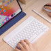 Magnetic wireless Bluetooth keyboard for iPad 2024 10.9 11 10.2 inch and universal 10 to 11.5 inch tablets slim rechargeable portable design attached to tablet on desk