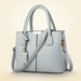  Fashion Satchel PU Leather Bag with solid design, featuring spacious interior with cell phone and zipper pockets.