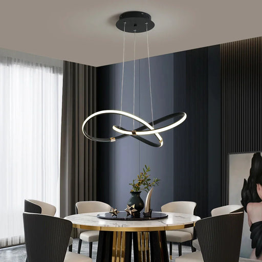 NANCHUANG modern black and gold multi-light E27 pendant lamp for bedrooms, living rooms, and hotels.