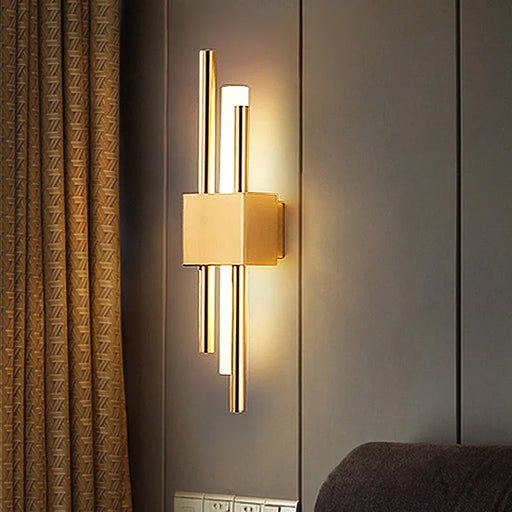 Black and gold contemporary LED wall lamp with dual up-and-down lighting for modern interiors.

