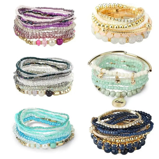 Bohemian handmade bracelet set featuring stackable beaded bangles with crystals, pearls, and colorful designs