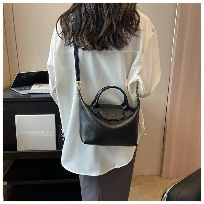Compact Unisex Barrel-Shaped Crossbody Bag with Modern Flap Design - Samanta Factory
