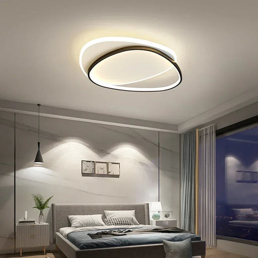 Modern minimalist sculptural LED ceiling light fixture for living room or bedroom interior