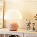 Modern dimmable LED table lamp with brushed nickel finish and frosted glass shade for bedroom.