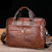 Men’s leather business briefcase with zipper closure and structured laptop compartment